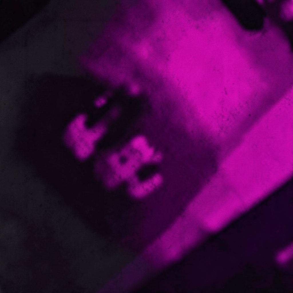 A duotone photograph in near-black and vivid pink showing a calendar or timeline motif representing recently logged data